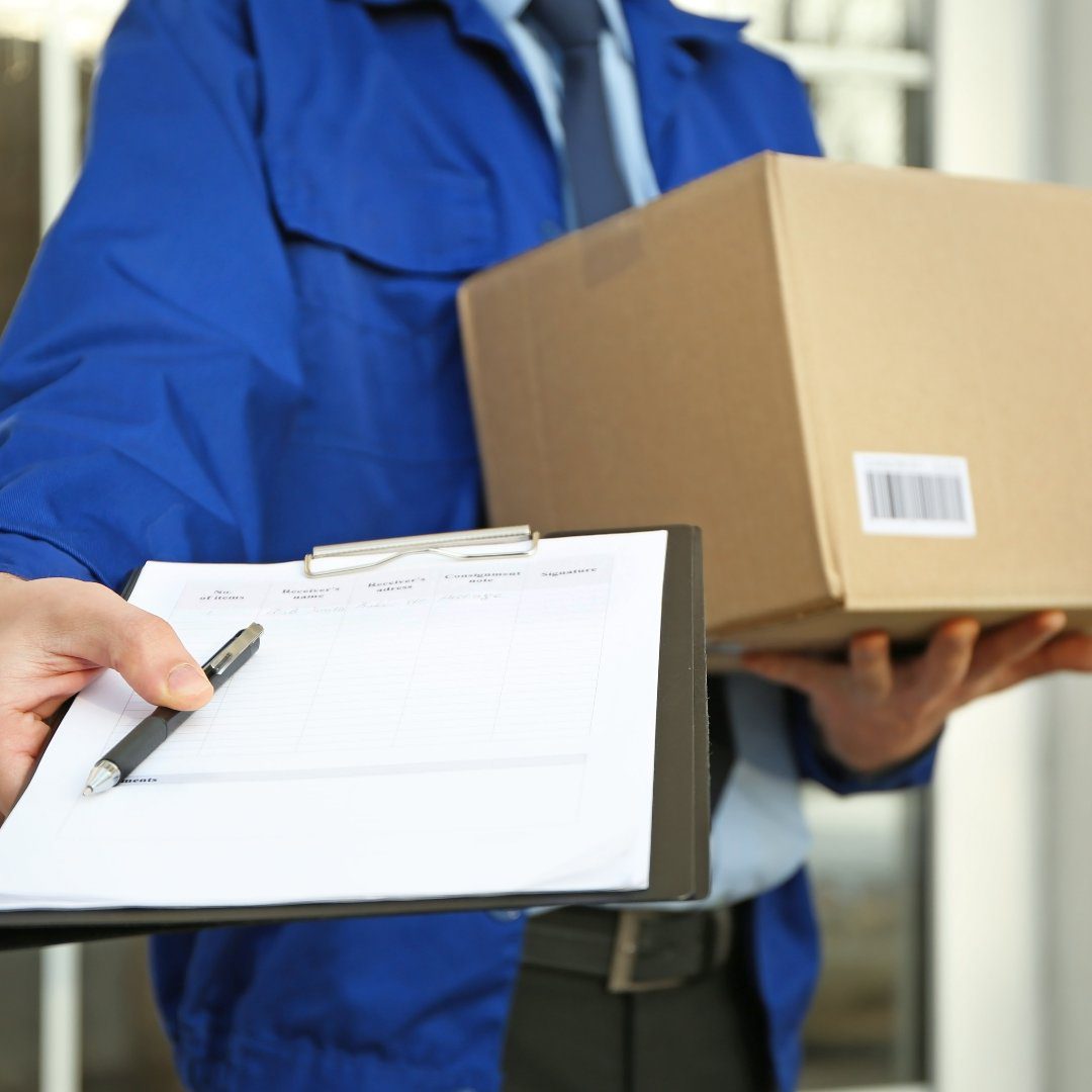 Courier with parcel and clipboard